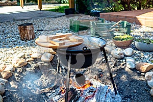 cooking traditional goulash in a 12 liter cauldron