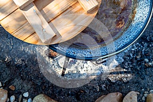 cooking traditional goulash in a 12 liter cauldron