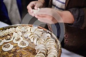 Cooking traditional nepalese meat dumplings