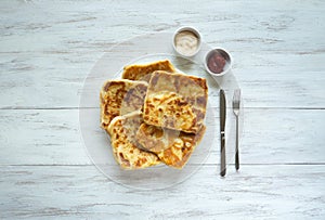 Cooking traditional pies with potatoes. Placinta, traditional Moldovan pastries