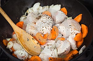 Cooking turkey with vegetables