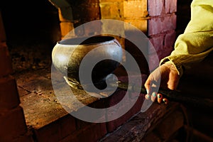 Cooking in a typical Russian stove