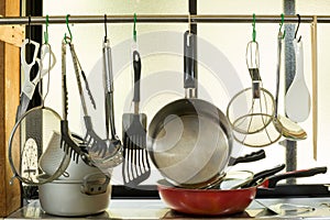 Cooking utensils on hooks