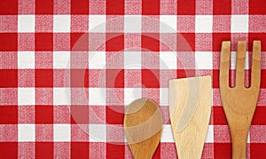 Cooking Utensils on a Red Tablecloth