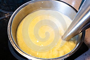 Cooking vegetable soup puree in stewpan