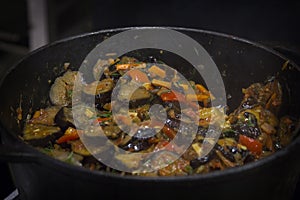 Cooking vegetable stew with eggplant