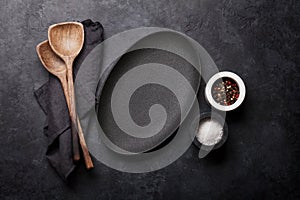 Cooking wooden utensils and empty plate