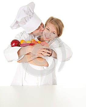 Cooks team with fruits and vegetables