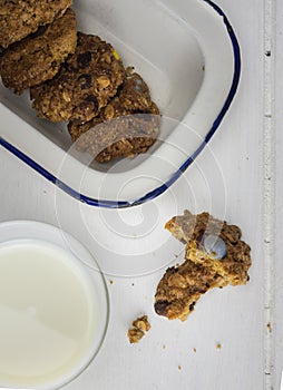 Cooky with milk and dish of cookies