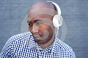 Cool african american man with headphones looking away