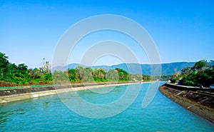 Cool blue river and blue sky photo