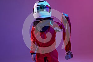 Cool boy child racer in helmet with medals, standing in neon light. Kart racing school poster. Competition announcement