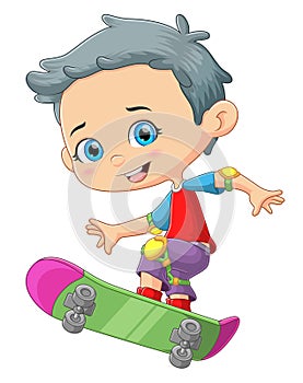 The cool boy is playing a skateboard and showing some trick