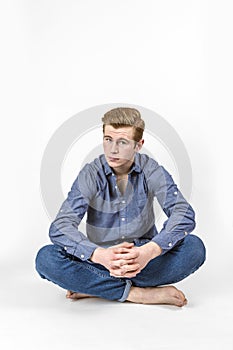 Cool boy with red hair posing