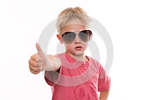 Cool boy with thumb up
