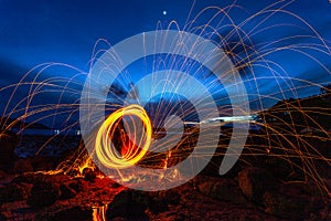 steel wool fire work on the rock