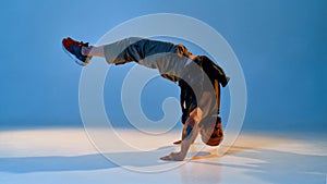 Cool caucasian male dancer dancing hip hop dance