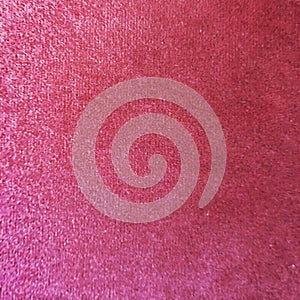 Close up of red colored wool textile