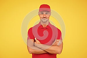 Cool and confident. Confident man keep arms crossed yellow background. Confident look of fashion model Happy guy smile