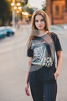 Cool and confident teen girl posing