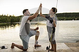 Cool Dad and son fishing on lake