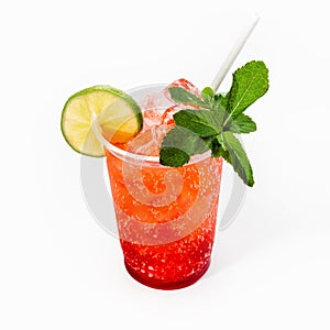 Cool delicious strawberry mojito cocktail decorated with mint and a slice of lime. Close-up, on a white background. Mock