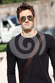 Cool fashion model man plain t-shirt & sunglasses