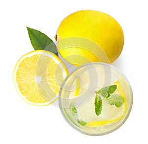 Cool freshly made lemonade and fruits on white background, top view