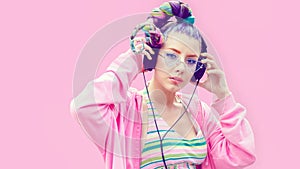 Cool funky teenage girl enjoy youth music on headphones