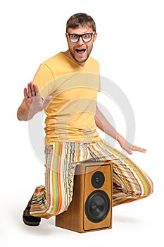 Cool funny dude dancing on the speaker photo