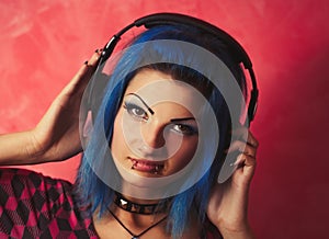 Cool girl DJ with dyed blue hair