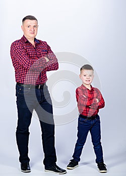Cool guys. Father little son red shirts family look outfit. Best friends forever. Happiness being father of boy. Dad and
