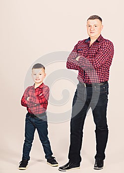 Cool guys. Father little son red shirts family look outfit. Best friends forever. Happiness being father of boy. Dad and