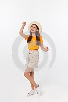 Cool hipster portrait of young stylish teen girl showing her hands up, positive mood and emotions,travel alone. Isolated