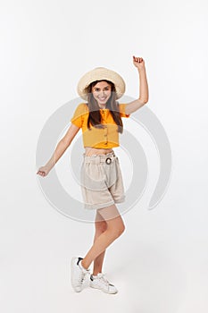 Cool hipster portrait of young stylish teen girl showing her hands up, positive mood and emotions,travel alone. Isolated