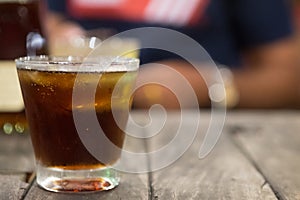 Cool iced soft drink cola carbonated liquid fresh food with soda water in clear glass