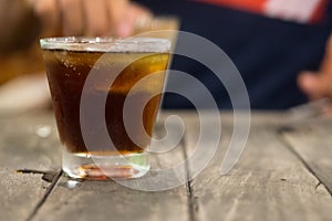 Cool iced soft drink cola carbonated liquid fresh food with soda water in clear glass
