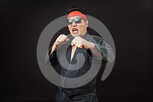 Cool karate fighter in sunglasses