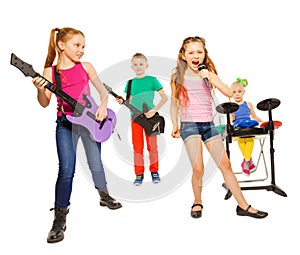 Cool kids play musical instruments as rock group
