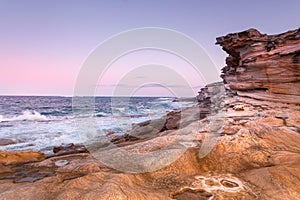 Cool pink hues of dusk against warm hues of sandstone