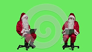 Cool saint nick using laptop