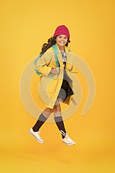 Cool schoolgirl. Have fun charismatic girl on yellow background. Madcap concept. Teen age. Girl adorable stylish modern photo