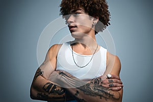 Cool tattooed gangsta with Afro hair