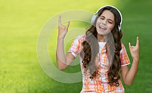 cool teen girl listen music. teen girl listen music. teen girl listen music outdoor