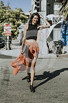 Cool woman with a longboard