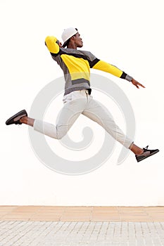 Cool young african man jumping in air