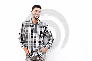 Cool young arabic man smiling against white background