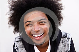 Cool young black guy with afro laughing