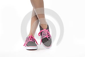 Cool young girl posing with pink lace new shoes