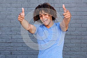 Cool young guy pointing fingers